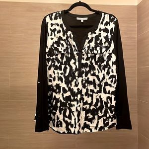 Abstract print long sleeve top. Size is Medium.